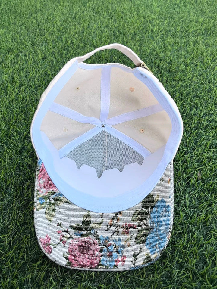 Neutral “He Still Does Miracles” Floral Trucker Hat