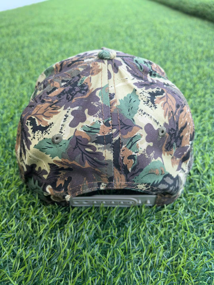 Camo “REVIVAL” Puff Embroidery Trucker Hat